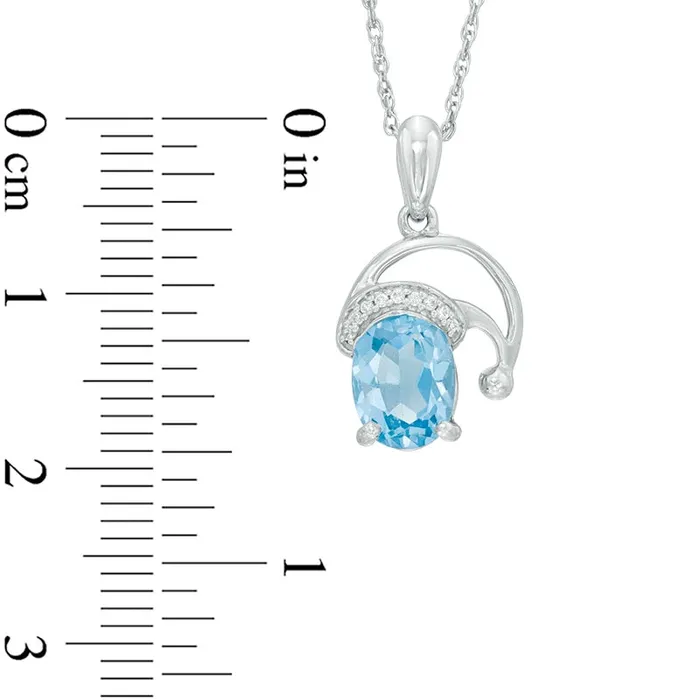 Necklaces Goldia Oval Blue Topaz and Natural Diamond Accent Santa Hat Pendant in Sterling Silver Necklaces Goldia Oval Blue Topaz and Natural Diamond Accent Santa Hat Pendant in Sterling Silver