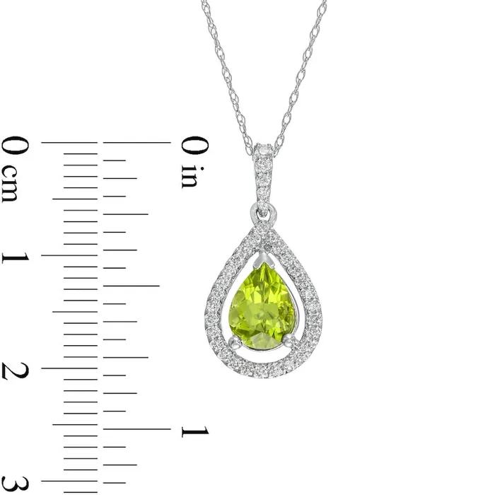 PearShaped Peridot and 025 CT TW Natural Diamond Frame Pendant in 14K White Gold Goldia Necklaces PearShaped Peridot and 025 CT TW Natural Diamond Frame Pendant in 14K White Gold Goldia Necklaces